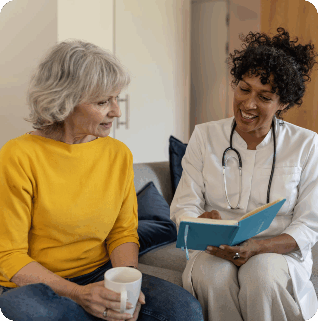 Doctor consulting with a patient at home.